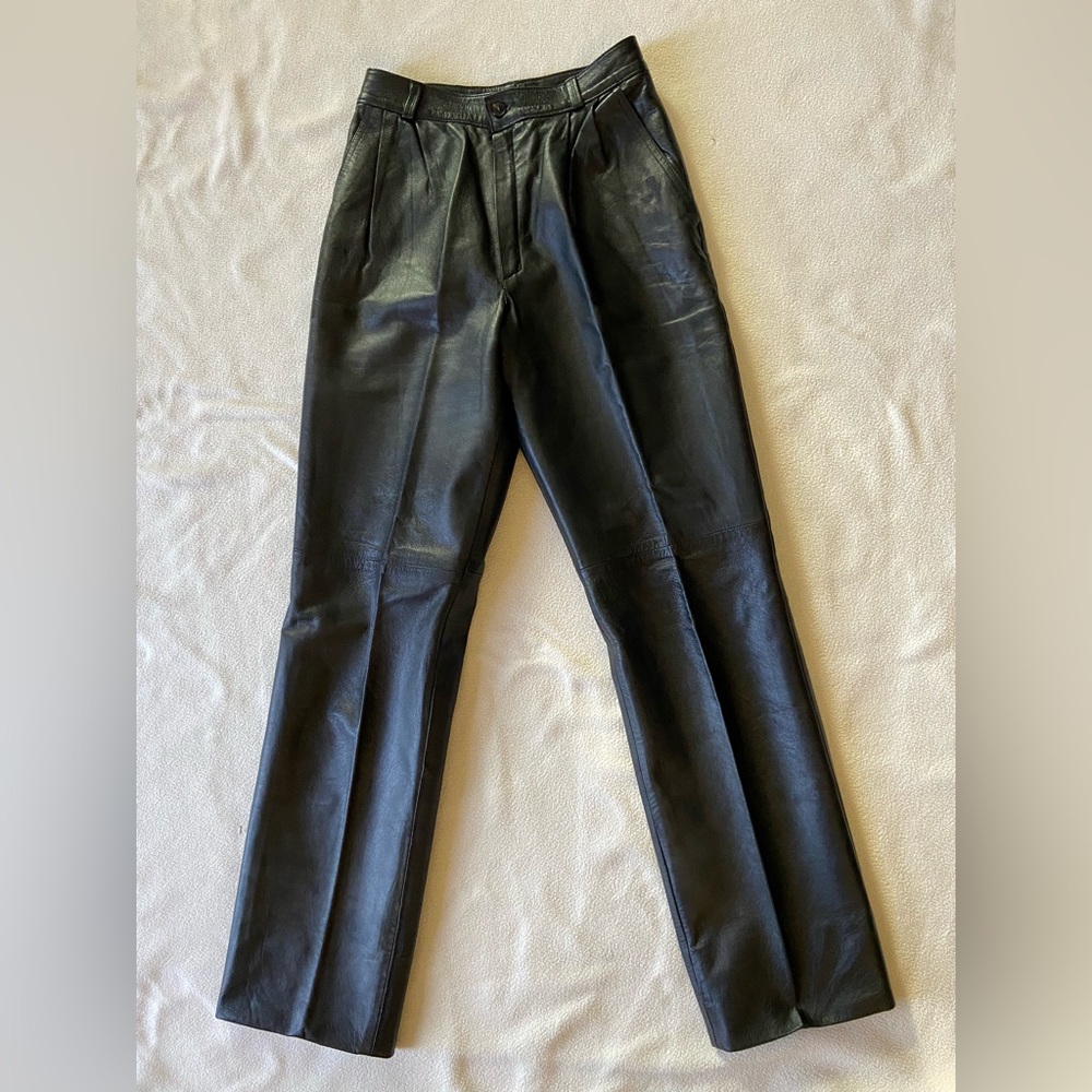 1980s lined French leather pants. Very small waist. Nice pleat detail.